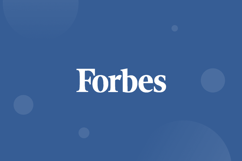 White Forbes logo on blue background